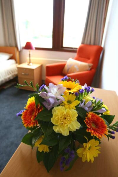 Manorfield Care Home Chichester - Fresh flower arrangements for resident bedrooms